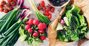 Freshly harvested radishes and green onions from Green Life Farms, a premier California produce supplier